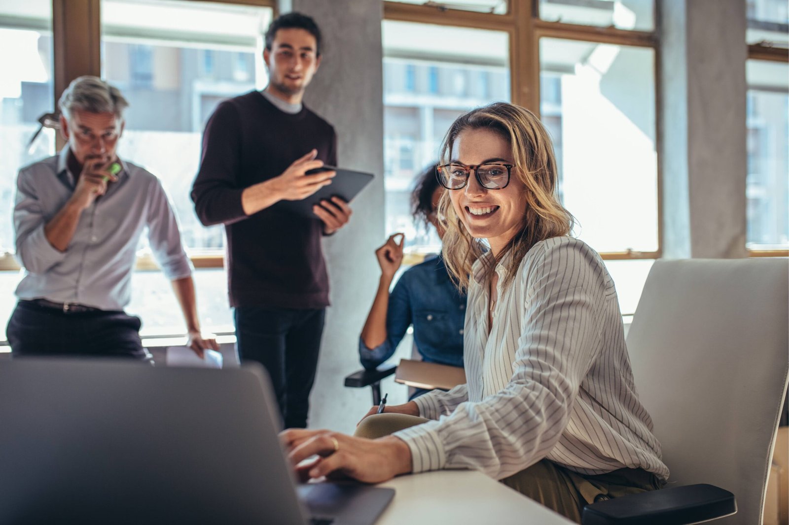Happy business owner reviewing campaign results